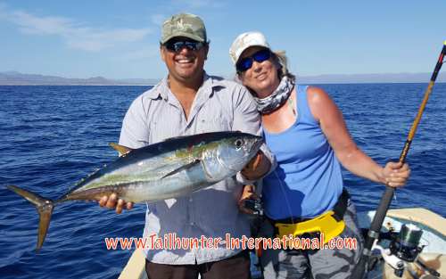 Shelley Reeve from Wyoming with her favorite captain Armando and another nice yellowfin tuna on light tackle!