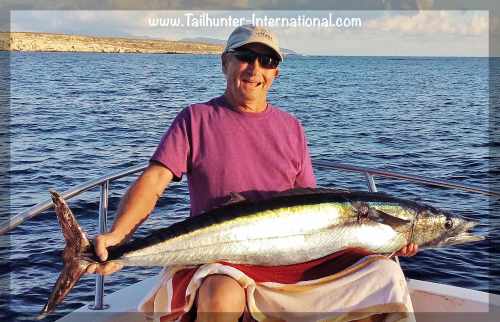 Happy Fella...Jack Steele spends a good part of the year in La Ventana and fishing with Captain Hugo put the wood to another speedy wahoo. 
